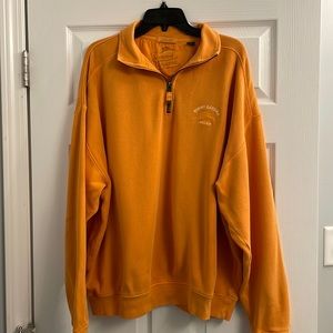 Tommy Bahama zip front relaxed pullover color gold.